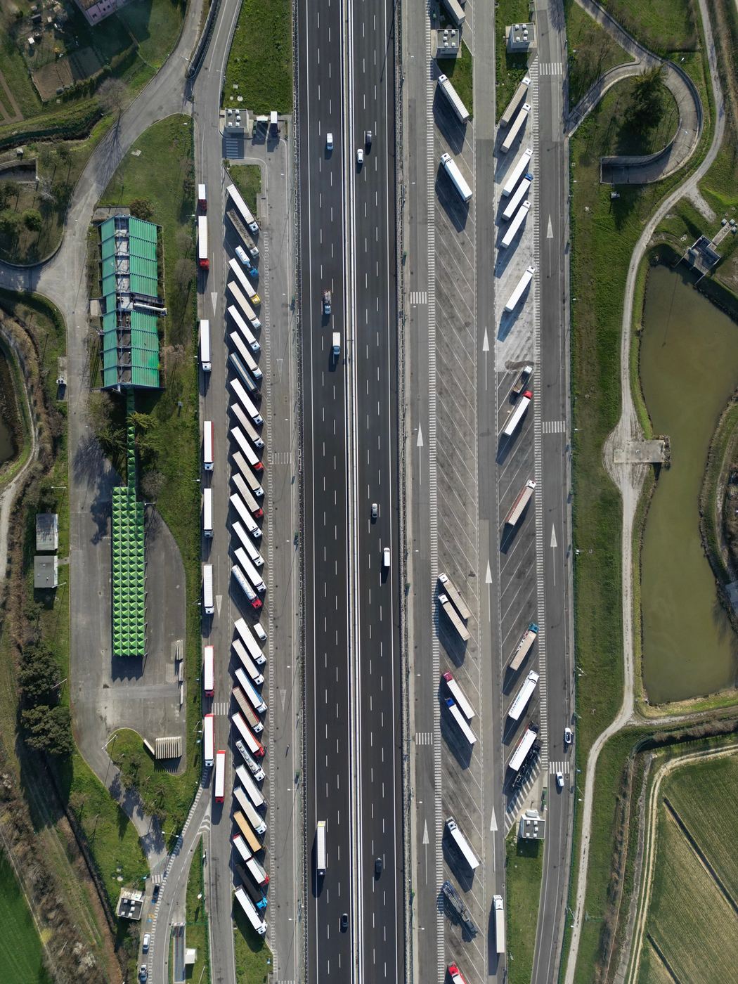 Aerial view of a highway and freight transport corridor